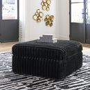  Manufacturer Color_Onyx -- Signature Design by Ashley Midnight Madness Fabric Ottoman IMAGE 4